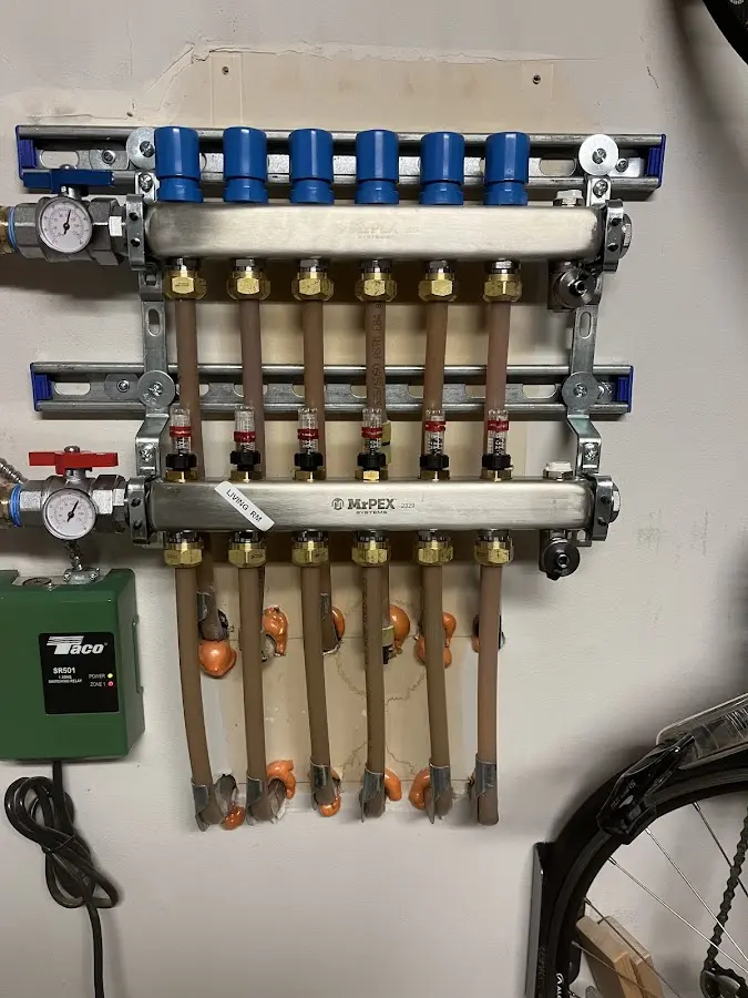 Plumber performing Gas Leak Detection at a residential property in Elk Ridge